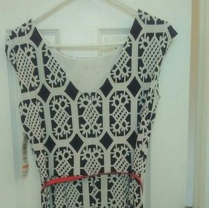 Black and white dress with a red belt